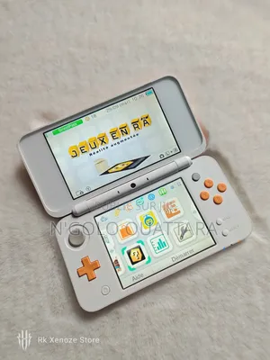 New 2ds XL Orange Cracker + Jeux