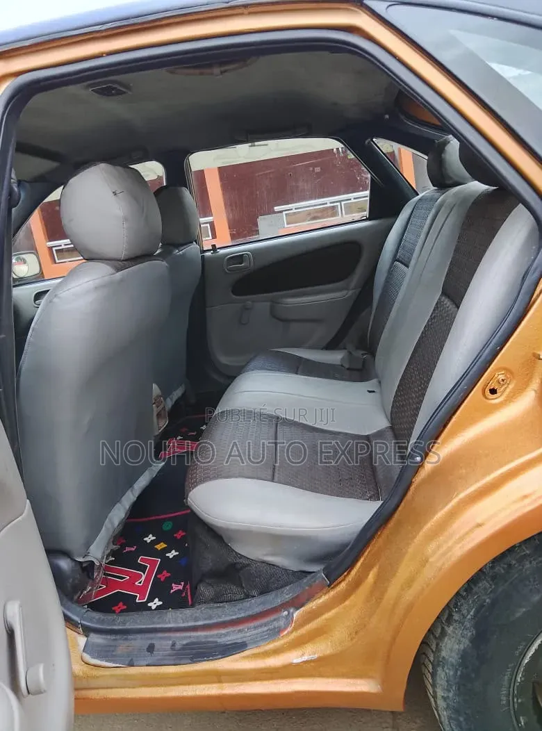 Toyota Corolla 2002 Orange