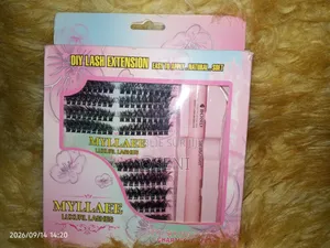 Extensions De Cils Composé d'Une Cole, d'Un Fixateur Et d'Une Pince.