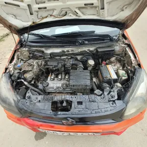 Suzuki Alto 2024 Orange