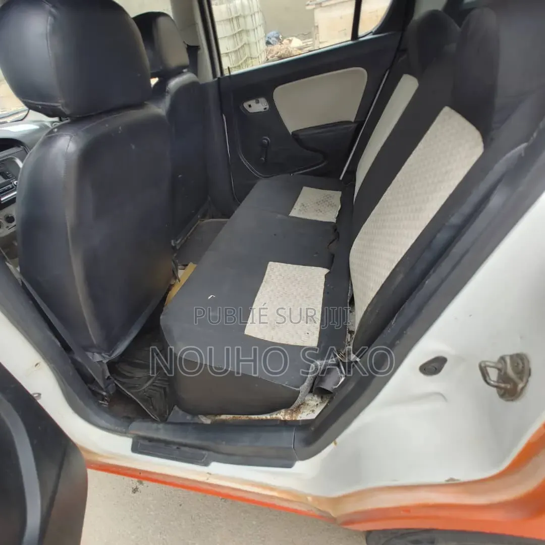 Suzuki Alto 2024 Orange