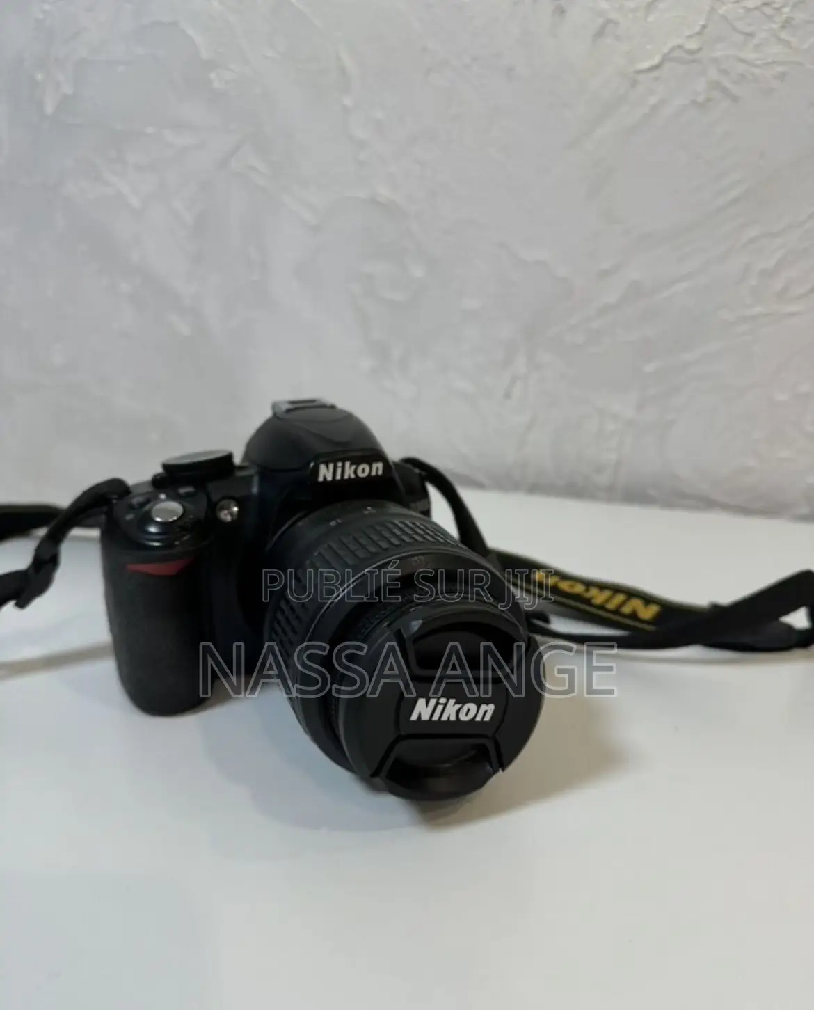 Nikon D3100 + 18 55mm