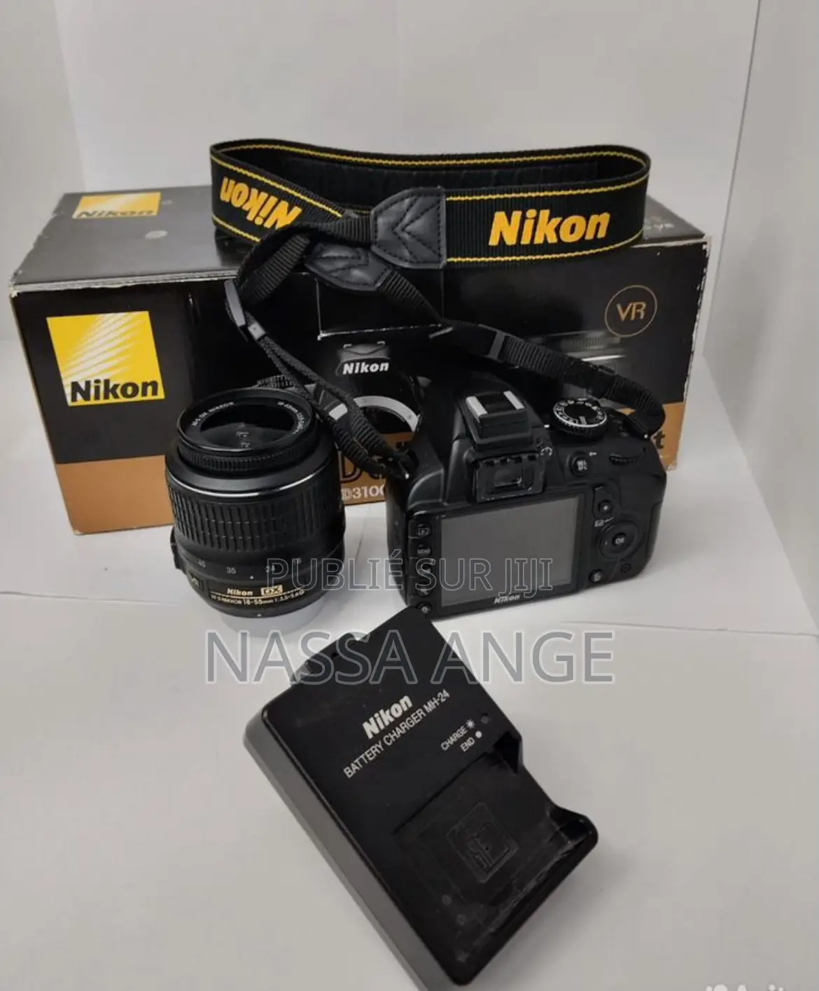 Nikon D3100 + 18 55mm