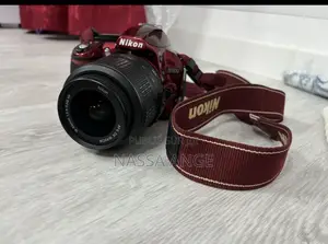 Photo - Nikon D3100 Rouge