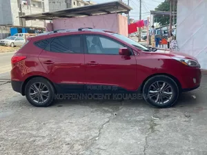 Photo - Hyundai Tucson Limited AWD 2015 Rouge