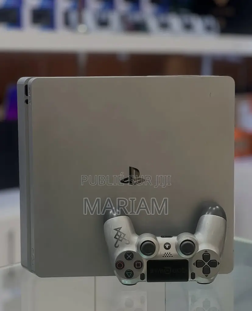 Ps4 Slim 1 Téra Quasi Neuf Avec 2 Manette Et Un Jeux Inclus