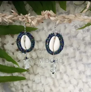 Boucle d'Oreilles Cauris Et Perle