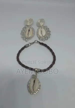 Boucle d'Oreilles Cauris Et Perle