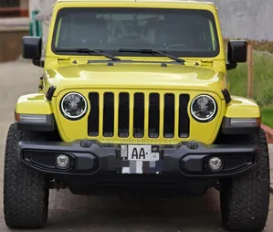 Photo - New Jeep Wrangler Sport Altitude 4 Door 4x4 2023 Vert