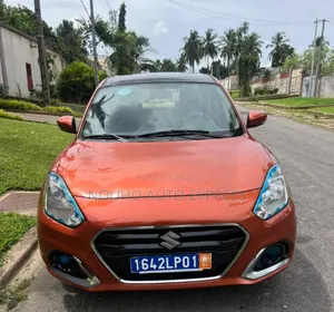 Photo - Suzuki Dzire 2022 Orange