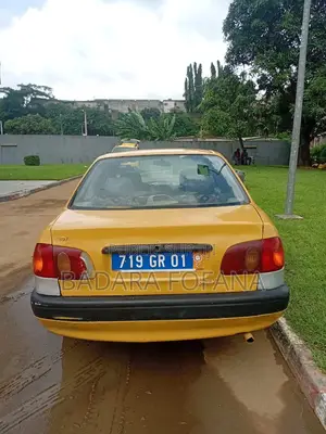 Photo - Toyota Echo 2015 Jaune