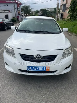 Photo - Toyota Corolla 2009 Blanc