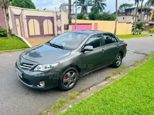 Photo - Toyota Corolla L 4dr Sedan (1.8L 4cyl 5M) 2012 Gris