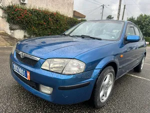 Mazda 323 1999 Bleu