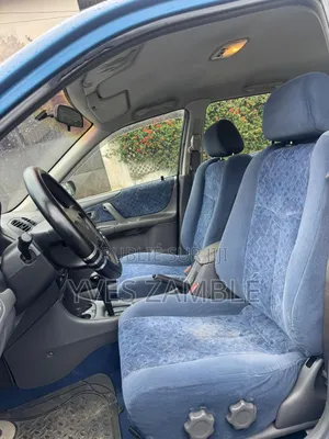 Mazda 323 1999 Bleu