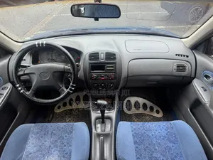 Mazda 323 1999 Bleu