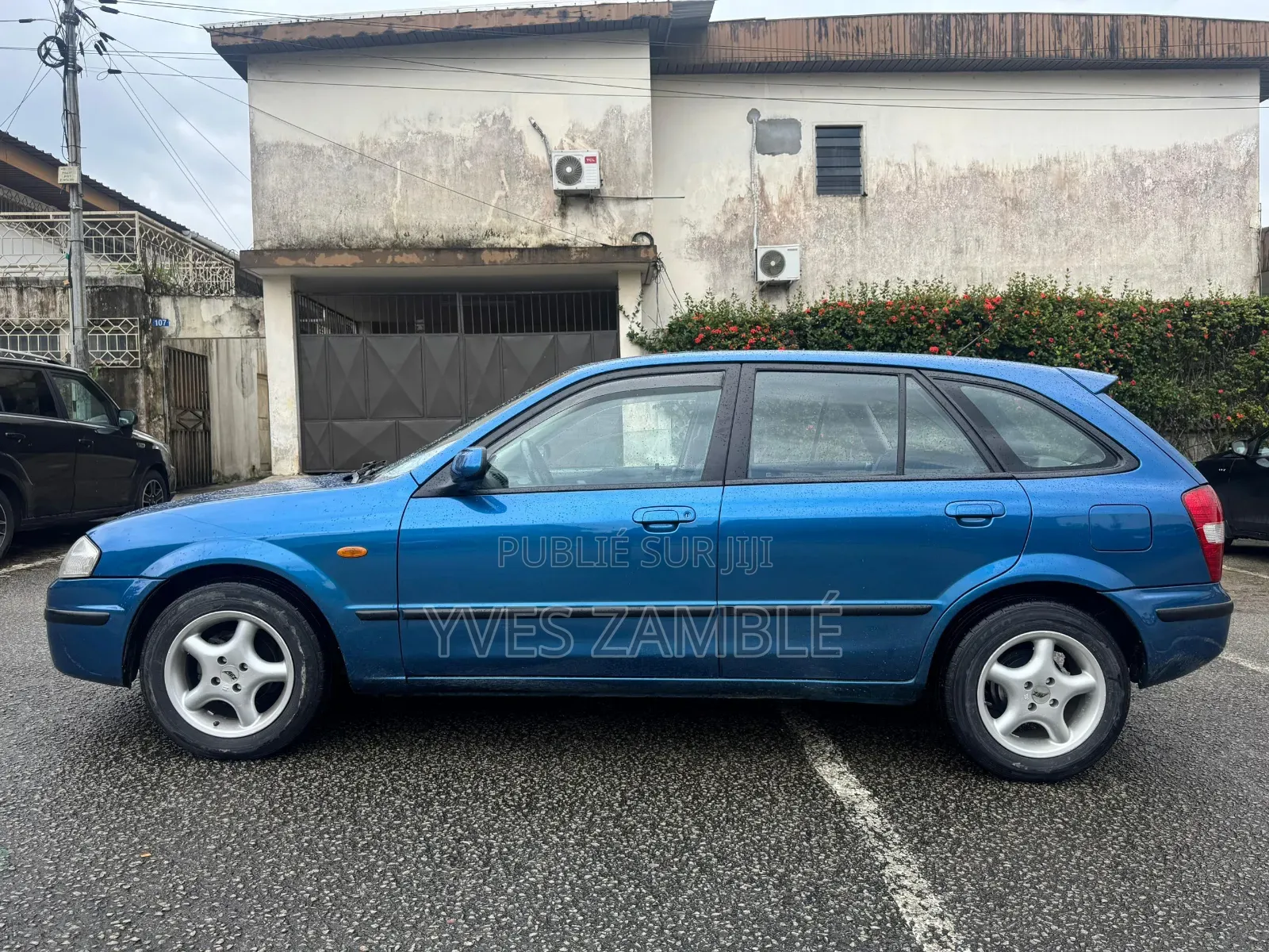 Mazda 323 1999 Bleu