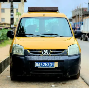 Photo - PEUGEOT Partenaire 2012 Jaune
