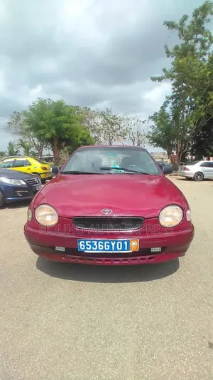 Photo - Toyota Corolla 2002 Rouge