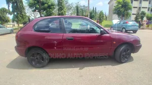 Toyota Corolla 2002 Rouge