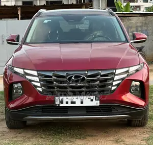 Photo - Hyundai Tucson Limited 2023 Rouge