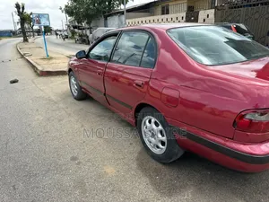 Toyota Corolla 1.9 D Sedan 2000 Rouge
