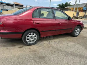 Toyota Corolla 1.9 D Sedan 2000 Rouge