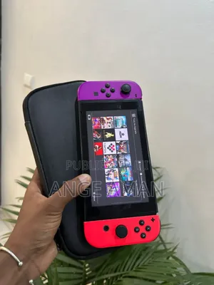 Photo - Nintendo Switch Classique Craquée +20 Jeux + Pochette