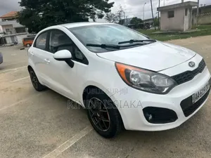 Photo - Kia Rio EX 4dr Hatchback (1.6L 4cyl 6A) 2014 Blanc cassé
