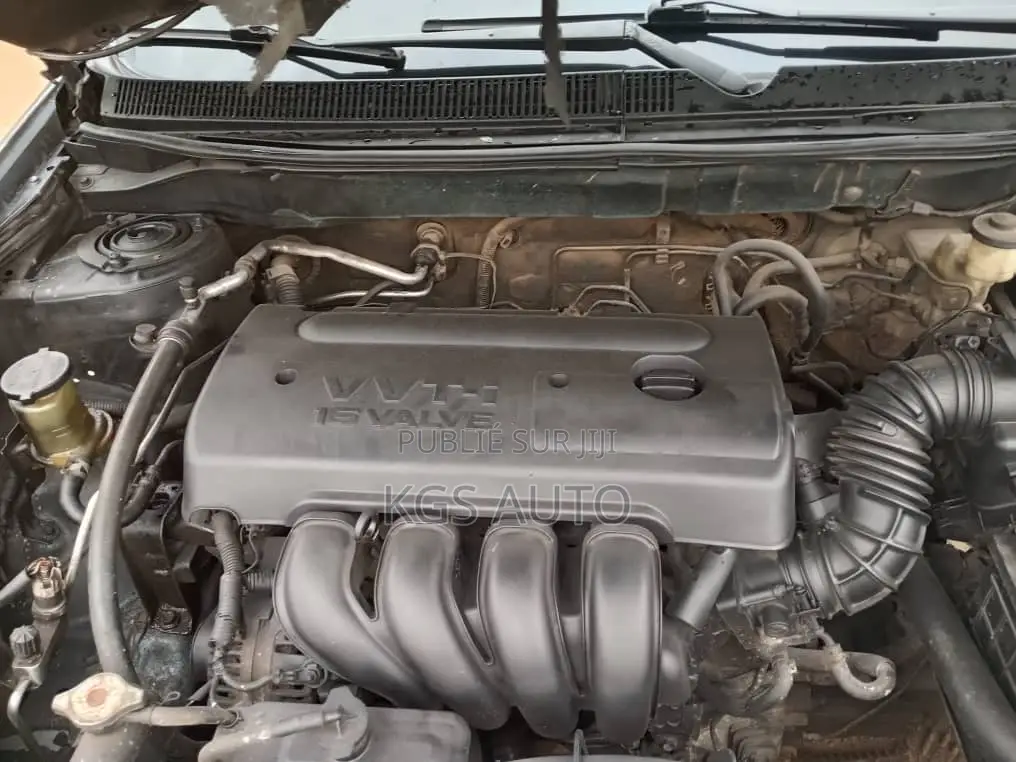 Toyota Matrix Hatchback AWD (1.8L 4cyl 4A) 2005 Bleu