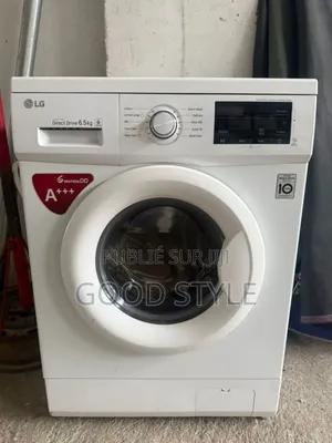 Photo - Machine a Laver