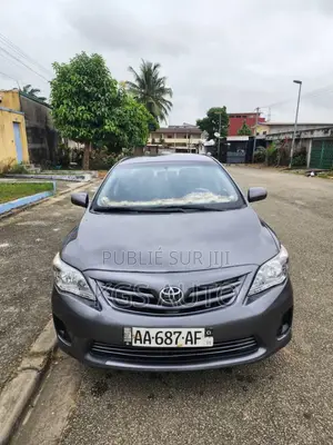Photo - Toyota Corolla L 4dr Sedan (1.8L 4cyl 5M) 2012 Gris