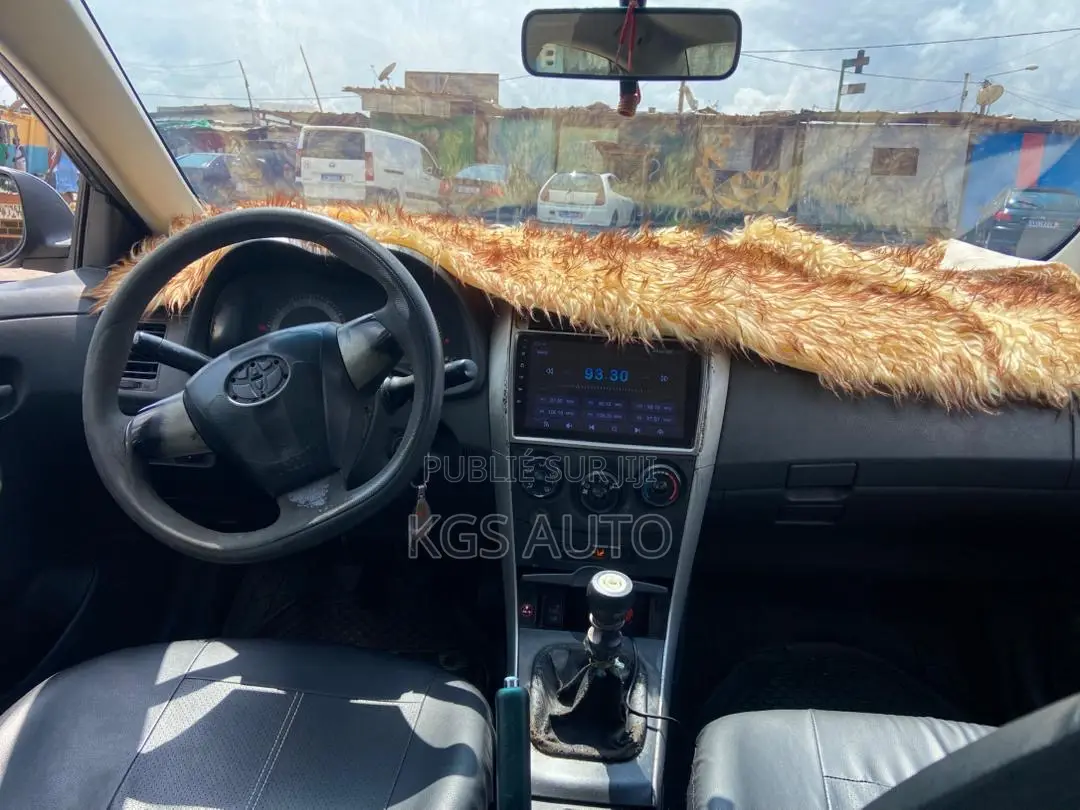 Toyota Corolla L 4dr Sedan (1.8L 4cyl 5M) 2012 Gris