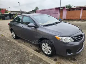 Toyota Corolla L 4dr Sedan (1.8L 4cyl 5M) 2012 Gris