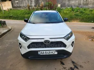 Photo - Toyota RAV4 LE AWD 2020 Blanc cassé