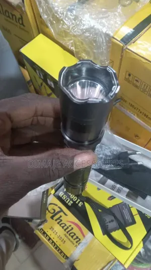 Photo - Taser + Torche À Longue Portée