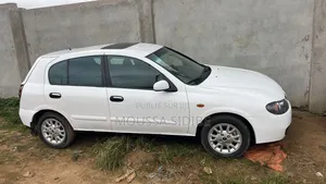 Photo - Nissan Almera Tino 2002 Blanc