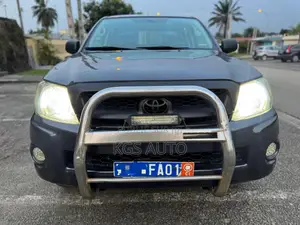 Photo - Toyota Hilux 2.5 D-4D 4X4 SRX 2010 Gris