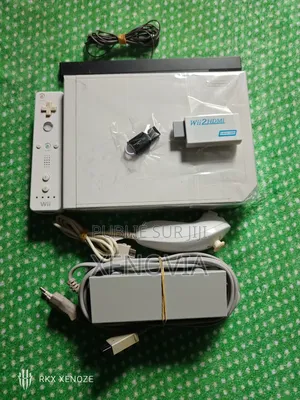 Photo - Nintendo Wii Cracker + Jeux