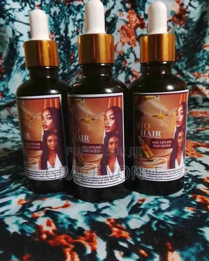 Photo - Huile Pour La Pousse Des Cheveux