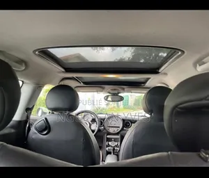 Mini Cooper 2009 Blanc cassé