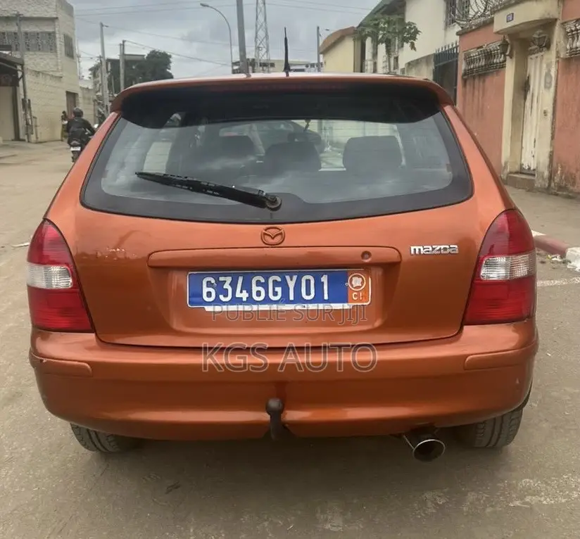 Mazda 323 1.6 2002 Orange