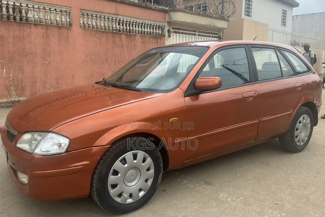 Mazda 323 1.6 2002 Orange