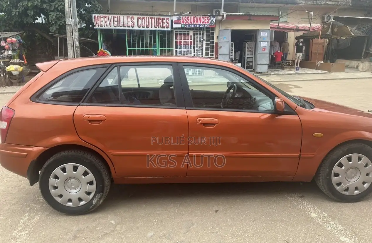Mazda 323 1.6 2002 Orange