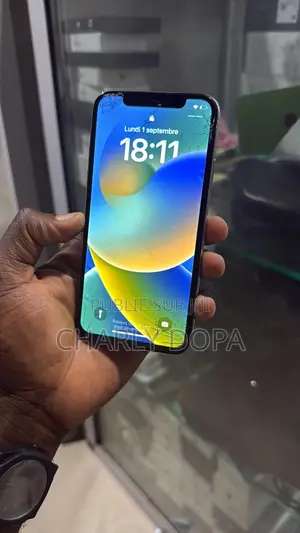 Photo - Pomme iPhone X 64 GB Blanc