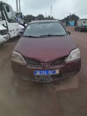 Photo - Nissan Primera Wagon 2000 Bordeaux