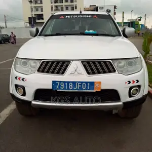 Photo - Mitsubishi L200 Double Cab 2.5 136hp 4WD 2010 Blanc