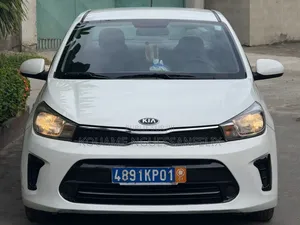 Photo - Kia Pegas 2021 Blanc cassé