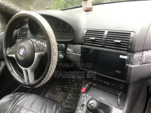 BMW 320i Sedan RWD 1999 Gris