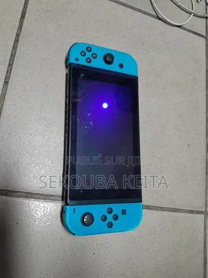 Photo - Nintendo Switch Avec Les Jeux 12 Installés Dedans